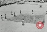 Image of folding a camouflage flat net United States USA, 1942, second 11 stock footage video 65675068405