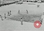 Image of folding a camouflage flat net United States USA, 1942, second 12 stock footage video 65675068405
