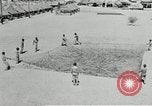 Image of folding a camouflage flat net United States USA, 1942, second 13 stock footage video 65675068405