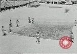 Image of folding a camouflage flat net United States USA, 1942, second 14 stock footage video 65675068405
