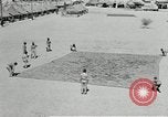 Image of folding a camouflage flat net United States USA, 1942, second 15 stock footage video 65675068405