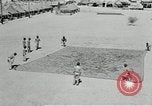 Image of folding a camouflage flat net United States USA, 1942, second 16 stock footage video 65675068405
