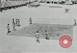 Image of folding a camouflage flat net United States USA, 1942, second 17 stock footage video 65675068405