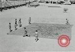 Image of folding a camouflage flat net United States USA, 1942, second 18 stock footage video 65675068405