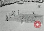 Image of folding a camouflage flat net United States USA, 1942, second 19 stock footage video 65675068405
