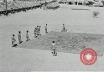 Image of folding a camouflage flat net United States USA, 1942, second 20 stock footage video 65675068405