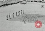 Image of folding a camouflage flat net United States USA, 1942, second 21 stock footage video 65675068405
