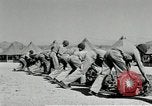 Image of folding a camouflage flat net United States USA, 1942, second 45 stock footage video 65675068405