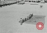 Image of folding a camouflage flat net United States USA, 1942, second 46 stock footage video 65675068405