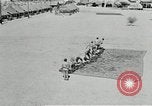 Image of folding a camouflage flat net United States USA, 1942, second 48 stock footage video 65675068405