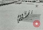 Image of folding a camouflage flat net United States USA, 1942, second 49 stock footage video 65675068405