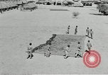 Image of folding a camouflage flat net United States USA, 1942, second 52 stock footage video 65675068405