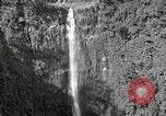 Image of activities near waterfall United States USA, 1916, second 4 stock footage video 65675068418