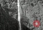 Image of activities near waterfall United States USA, 1916, second 6 stock footage video 65675068418