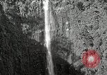 Image of activities near waterfall United States USA, 1916, second 7 stock footage video 65675068418