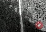 Image of activities near waterfall United States USA, 1916, second 9 stock footage video 65675068418