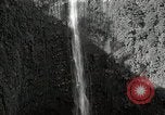 Image of activities near waterfall United States USA, 1916, second 12 stock footage video 65675068418