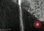 Image of activities near waterfall United States USA, 1916, second 13 stock footage video 65675068418