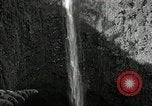 Image of activities near waterfall United States USA, 1916, second 14 stock footage video 65675068418