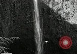 Image of activities near waterfall United States USA, 1916, second 16 stock footage video 65675068418