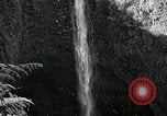 Image of activities near waterfall United States USA, 1916, second 18 stock footage video 65675068418