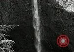 Image of activities near waterfall United States USA, 1916, second 19 stock footage video 65675068418