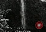 Image of activities near waterfall United States USA, 1916, second 22 stock footage video 65675068418