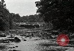 Image of activities near waterfall United States USA, 1916, second 33 stock footage video 65675068418