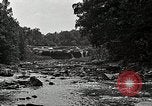 Image of activities near waterfall United States USA, 1916, second 36 stock footage video 65675068418