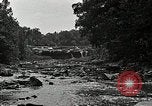 Image of activities near waterfall United States USA, 1916, second 37 stock footage video 65675068418