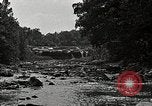 Image of activities near waterfall United States USA, 1916, second 38 stock footage video 65675068418