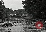 Image of activities near waterfall United States USA, 1916, second 41 stock footage video 65675068418