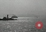 Image of activities near waterfall United States USA, 1916, second 52 stock footage video 65675068418
