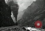 Image of activities near waterfall United States USA, 1916, second 60 stock footage video 65675068418