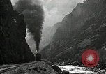 Image of activities near waterfall United States USA, 1916, second 61 stock footage video 65675068418