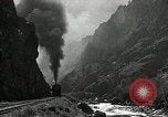 Image of activities near waterfall United States USA, 1916, second 62 stock footage video 65675068418