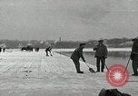 Image of Cutting ice blocks from a frozen lake United States USA, 1916, second 1 stock footage video 65675068419