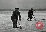 Image of Cutting ice blocks from a frozen lake United States USA, 1916, second 9 stock footage video 65675068419