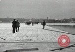Image of Cutting ice blocks from a frozen lake United States USA, 1916, second 13 stock footage video 65675068419