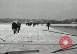 Image of Cutting ice blocks from a frozen lake United States USA, 1916, second 14 stock footage video 65675068419