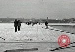 Image of Cutting ice blocks from a frozen lake United States USA, 1916, second 15 stock footage video 65675068419