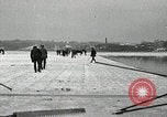 Image of Cutting ice blocks from a frozen lake United States USA, 1916, second 16 stock footage video 65675068419
