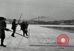 Image of Cutting ice blocks from a frozen lake United States USA, 1916, second 20 stock footage video 65675068419