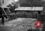 Image of Soldiers of 151st Field Artillery Regiment pitch quoits Neuf Maison France, 1918, second 16 stock footage video 65675068481