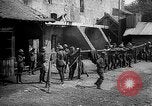 Image of Soldiers of 151st Field Artillery Regiment pitch quoits Neuf Maison France, 1918, second 23 stock footage video 65675068481