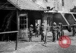 Image of Soldiers of 151st Field Artillery Regiment pitch quoits Neuf Maison France, 1918, second 27 stock footage video 65675068481