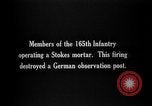 Image of 165th Infantry Regiment troops fire a mortar France, 1918, second 4 stock footage video 65675068484