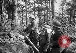Image of 165th Infantry Regiment troops fire a mortar France, 1918, second 13 stock footage video 65675068484