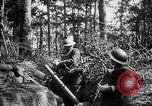 Image of 165th Infantry Regiment troops fire a mortar France, 1918, second 20 stock footage video 65675068484