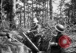 Image of 165th Infantry Regiment troops fire a mortar France, 1918, second 21 stock footage video 65675068484